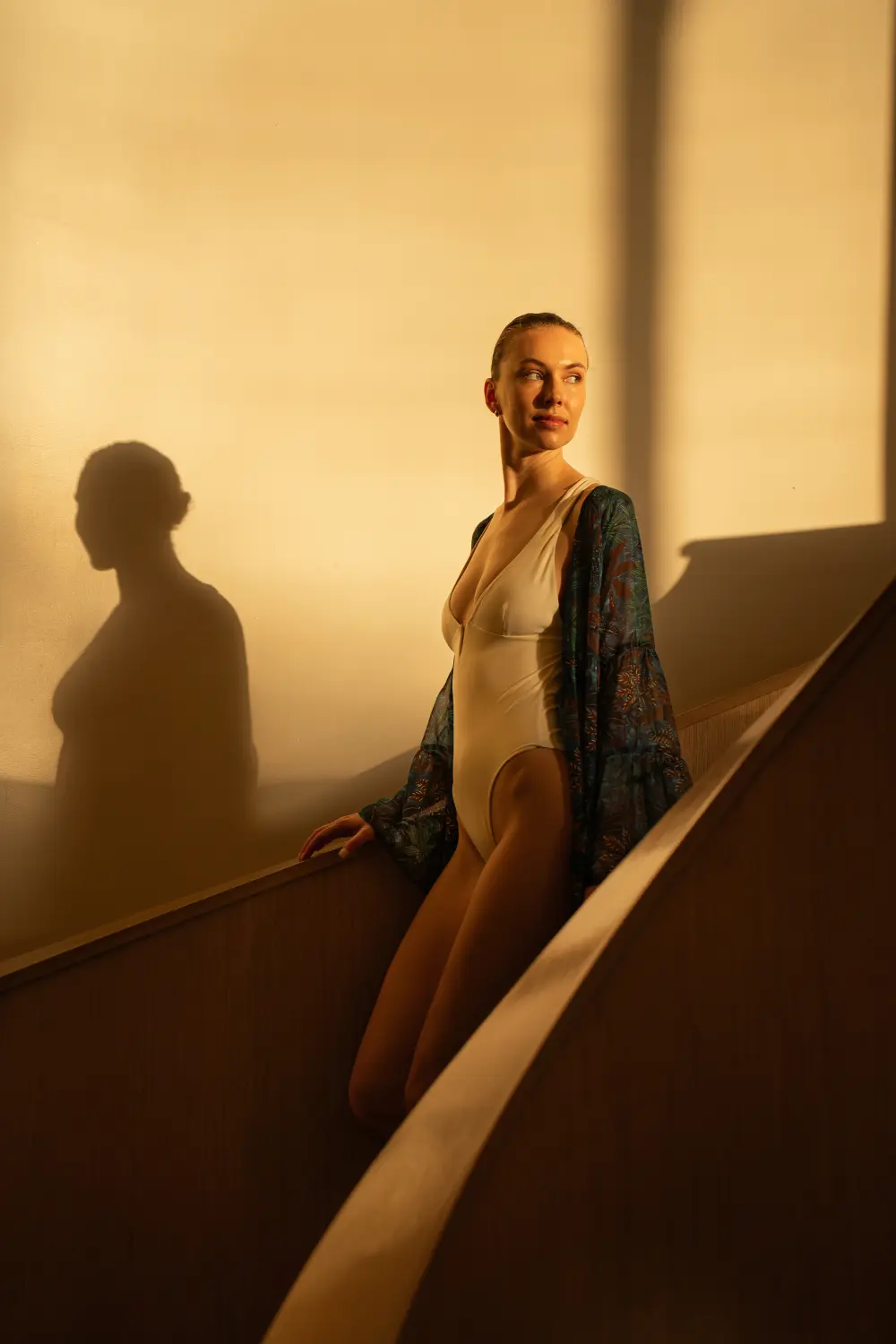 Resident on a sunlit staircase