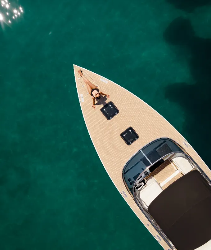 Yacht crossing turquoise water